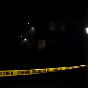 Police lights at night near a residential building in Atlanta