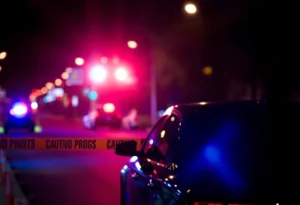 Police lights and caution tape at a car break-in scene in Atlanta
