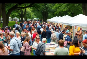 Scene from the Black Romance Book Fest with diverse attendees and book booths.