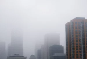Heavy fog covering metro Atlanta buildings.