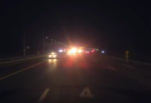 Police lights on I-75 after a tragic road rage incident