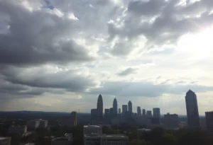 A view of Atlanta with mixed weather featuring clouds and sun