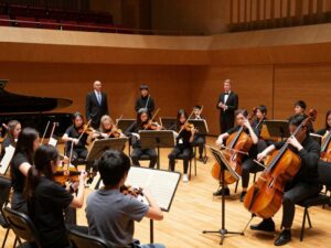Young audience members engaging with classical music at Atlanta Symphony Hall.