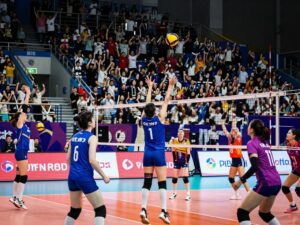 LOVB volleyball match with fans cheering