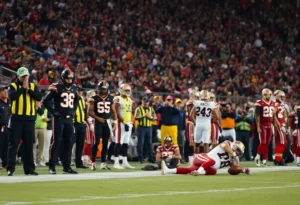 Injured players on the sidelines during a football game