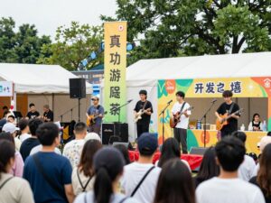 Crowds enjoying the Atlanta music festival with live performances and food stalls