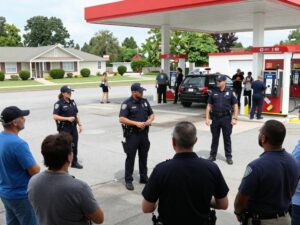 Police investigating a gas station incident in Covington