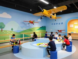 Children interacting with the Tuskegee Airmen exhibit at the Children's Museum of Atlanta