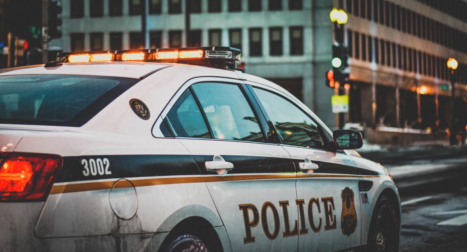 Police patrol car parked on a city street