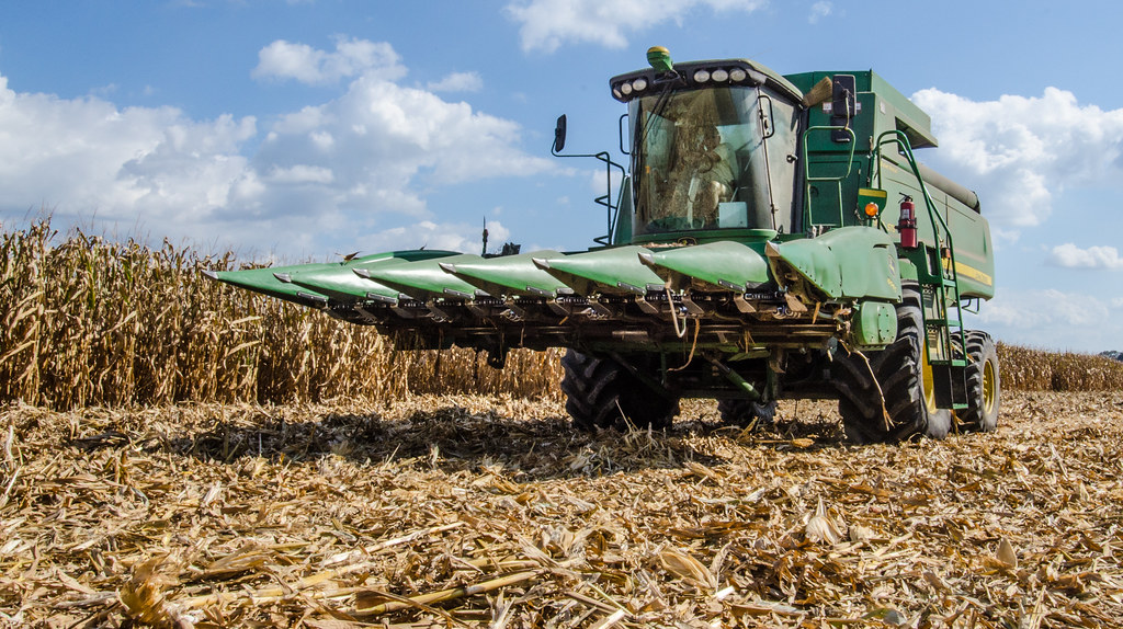 Combine harvesting a field