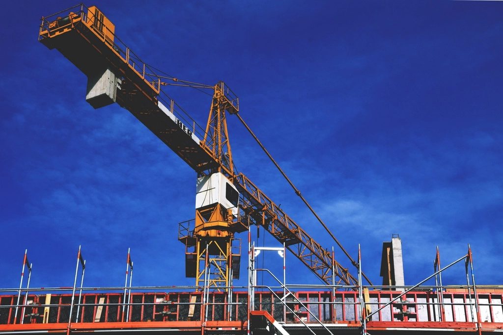 Construction crane over a building site