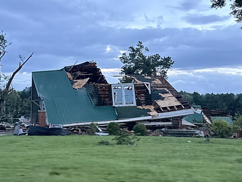 Wreckage and downed trees after a tornado
